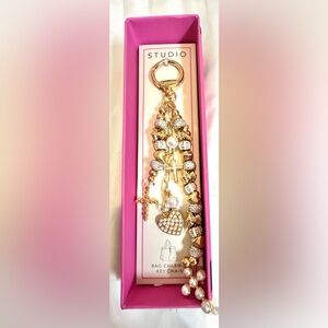 Beautiful Gold and Silver key chain or purse charm .